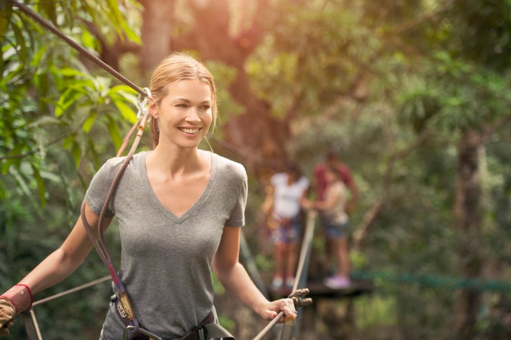 Woman preparing for a zipline