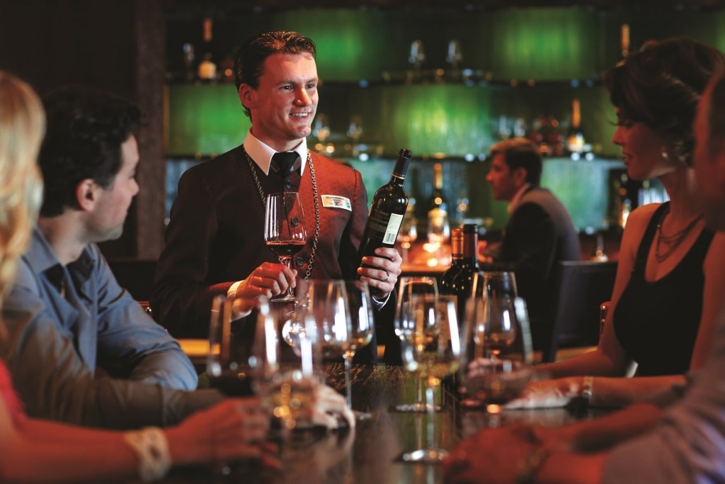 Sommelier discussing wine to guests