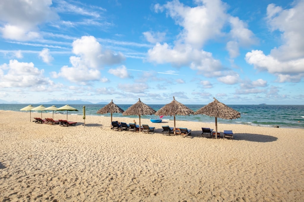 Beach umbrellas lined up in An Bang Beach