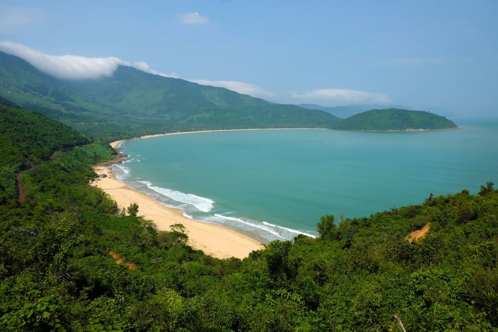 Aerial view of Lang Co Beach surrounded by mountains