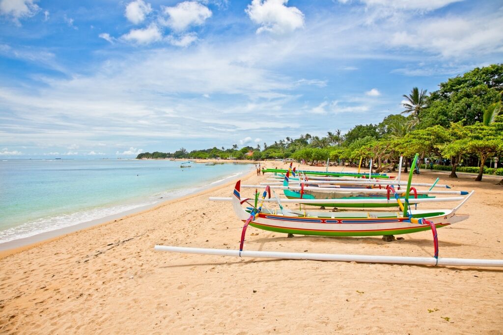 Beautiful Nusa Dua Beach with small boats lined up