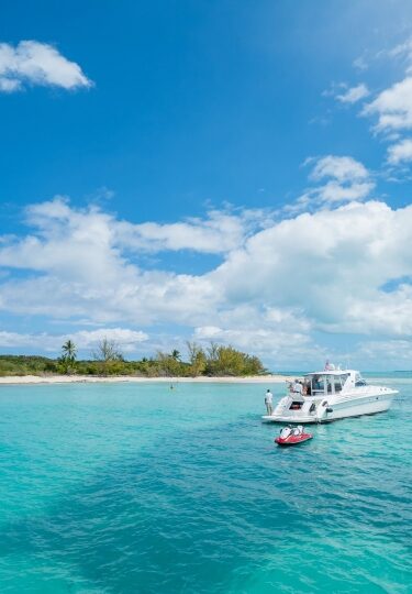Boat along clear waters of Nassau