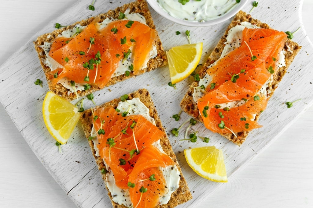 Popular norwegian food gravlaks on top of sandwiches