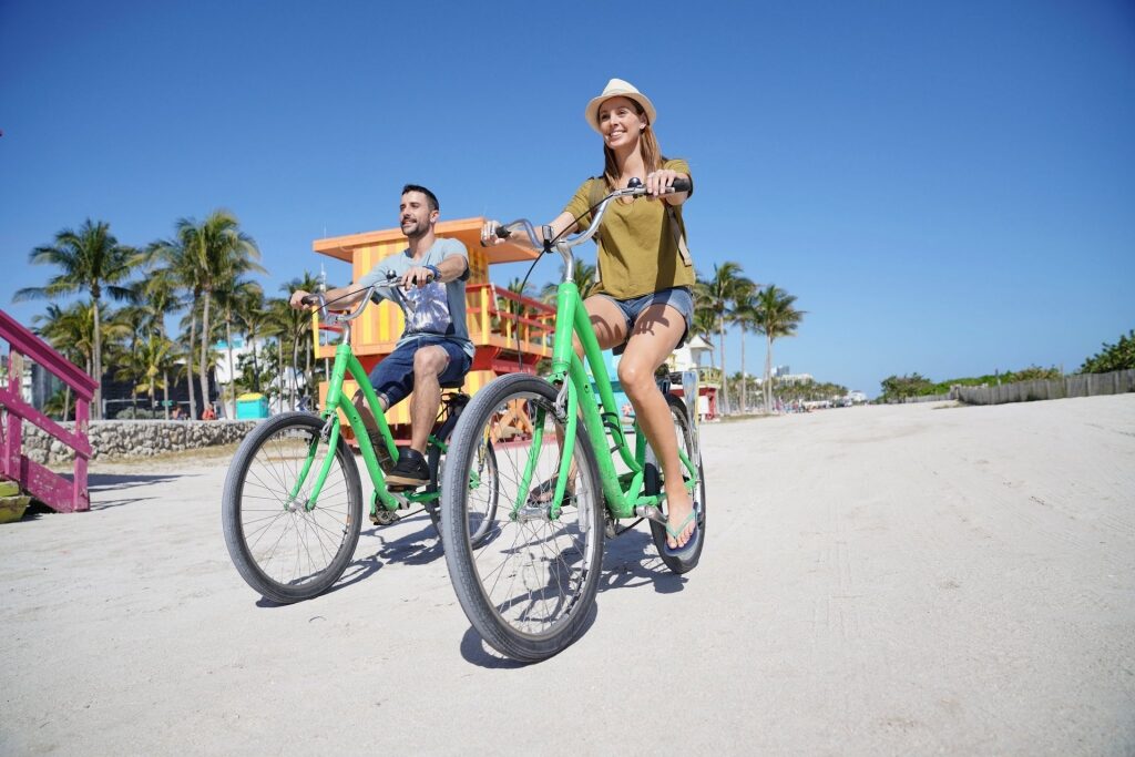 Couple biking in Miami