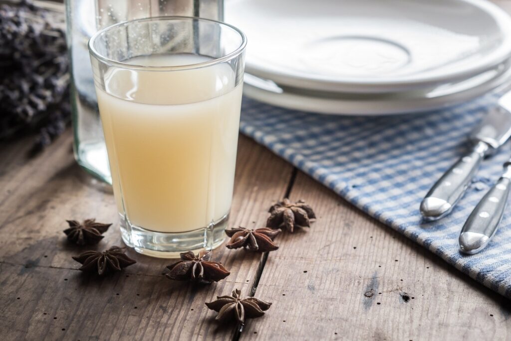 Glass of pastis on a table