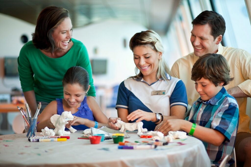 Kids creating arts and crafts on a cruise