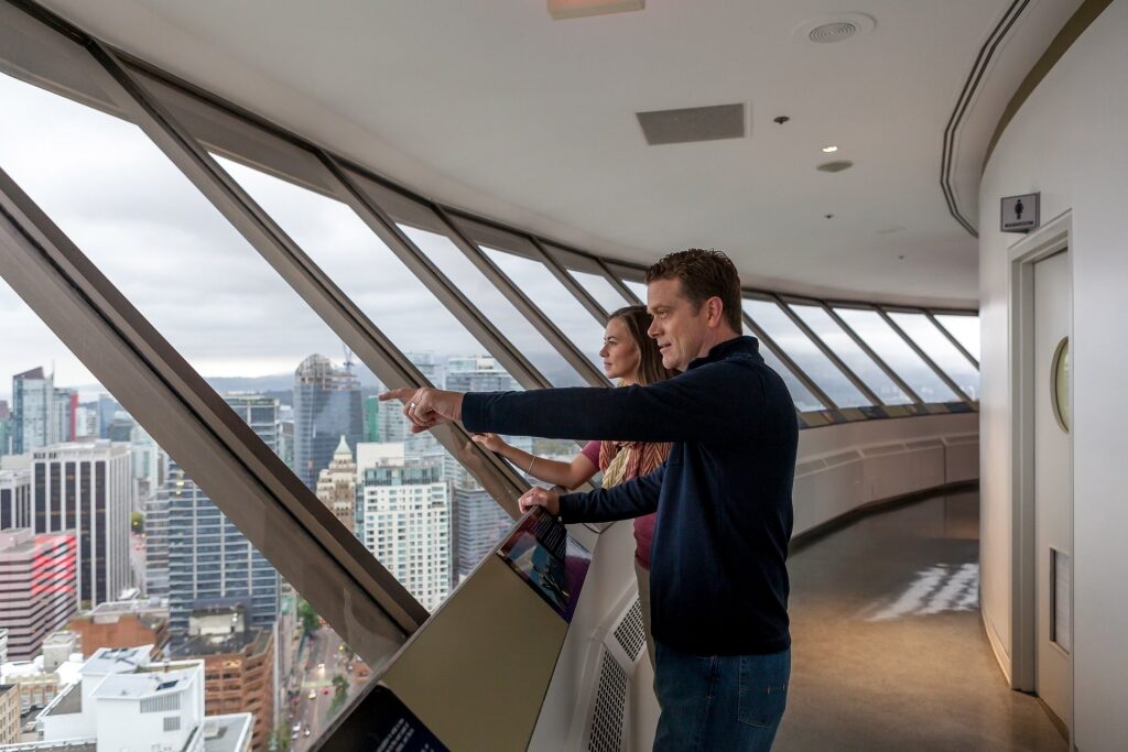 Couple sightseeing from Vancouver Lookout