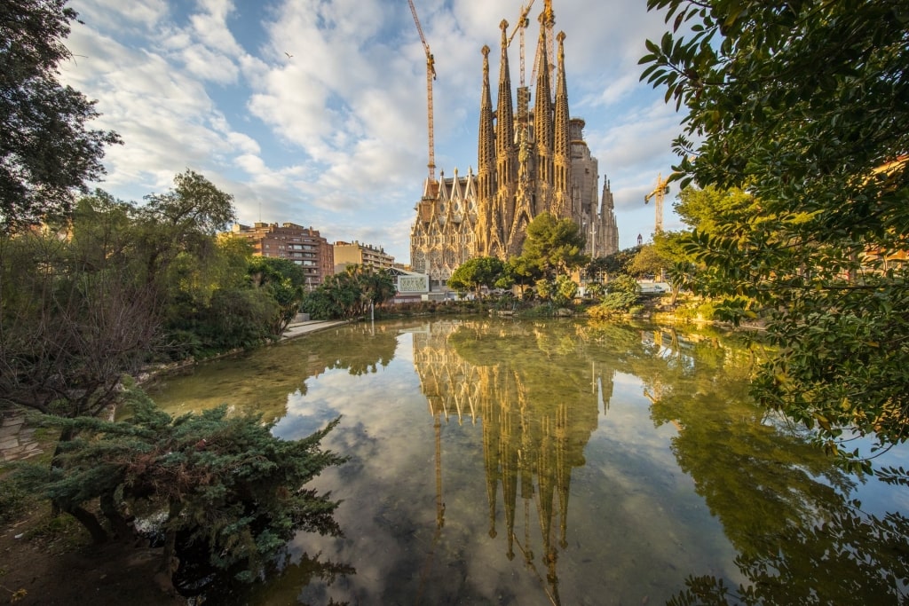 Sagrada Familia in Spain reflecting on water