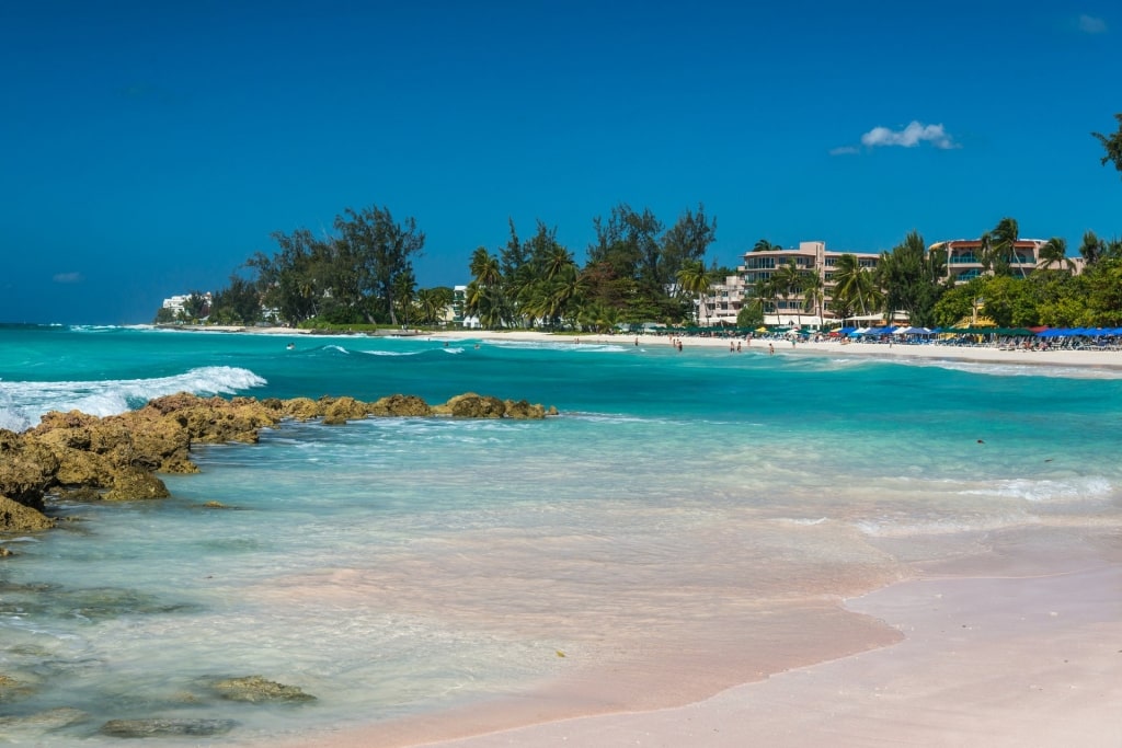 Turquoise water and pinkish sands of Accra Beach