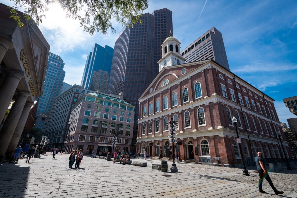 People passing by Faneuil Hall