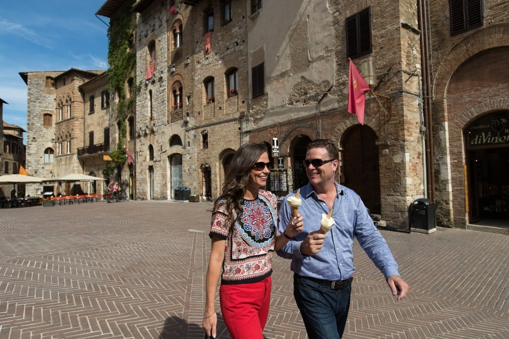 Couple walking the streets of Florence with gelato