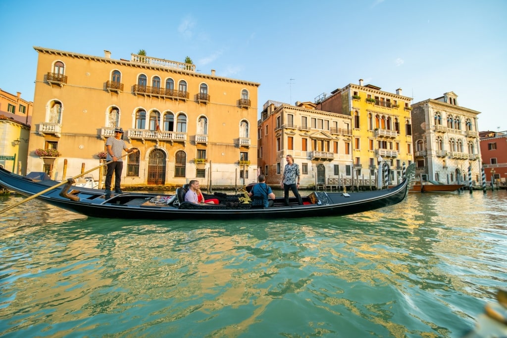 Couple enjoying a romantic gondola ride in Venice