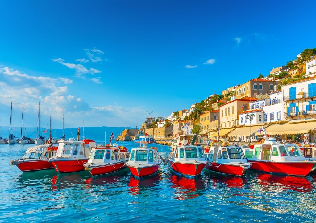 Colorful taxi boats in Hydra, one of the best Greek Islands for couples