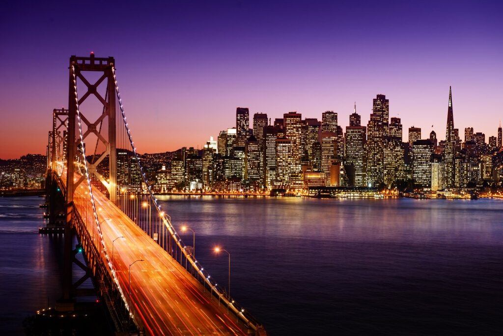 Beautiful skyline of San Francisco with Bay Bridge at sunset