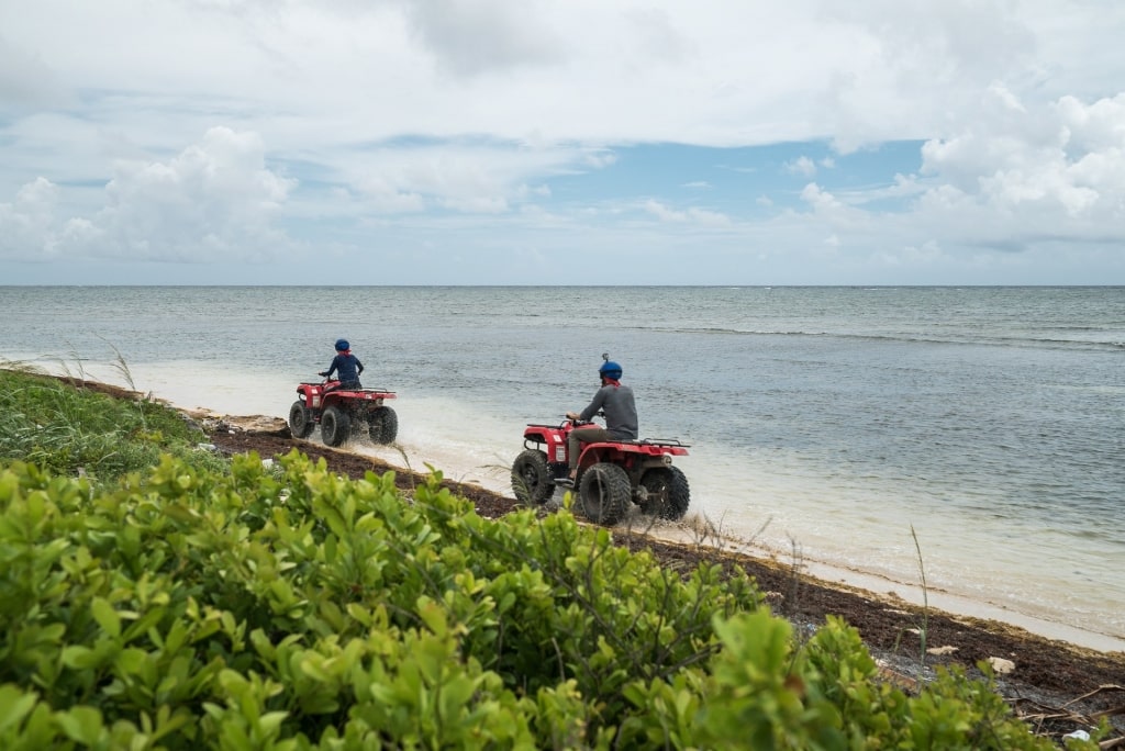 People on an ATV in Costa Maya