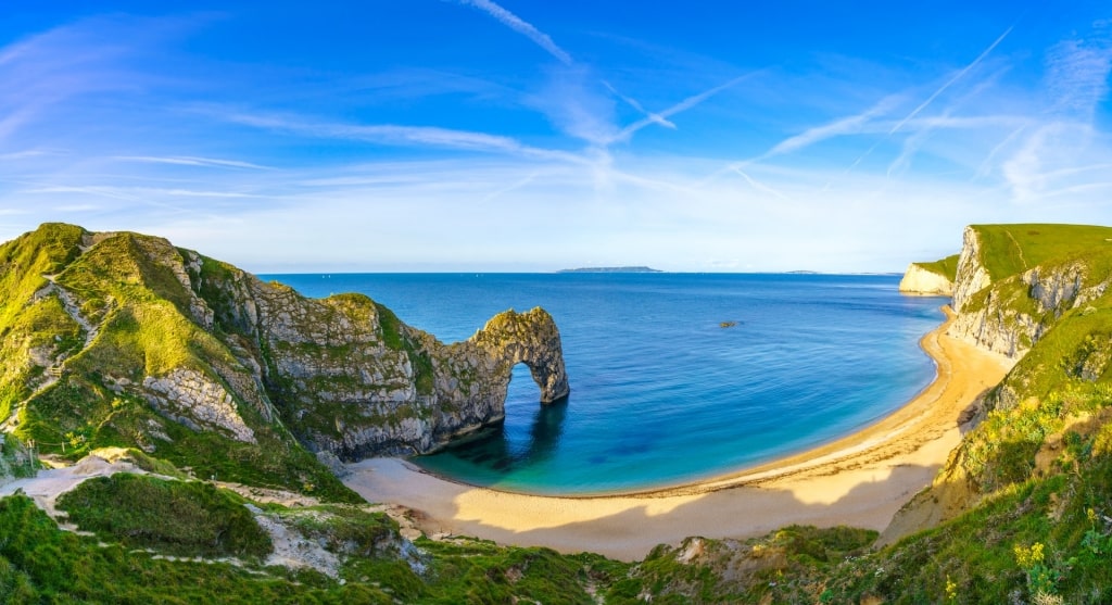 Cliff towering over beach at Jurassic Coast