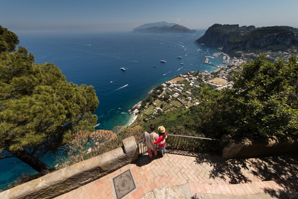 Couple sightseeing from a viewpoint in Capri