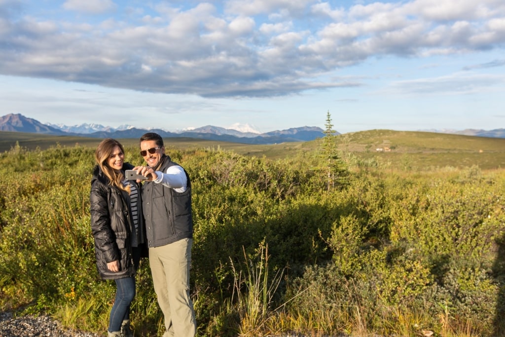 Couple talking a selfie in Denali National Park