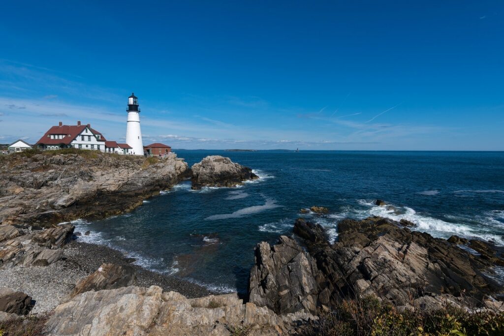 Rocky coast and lighthouse in Portland, Maine