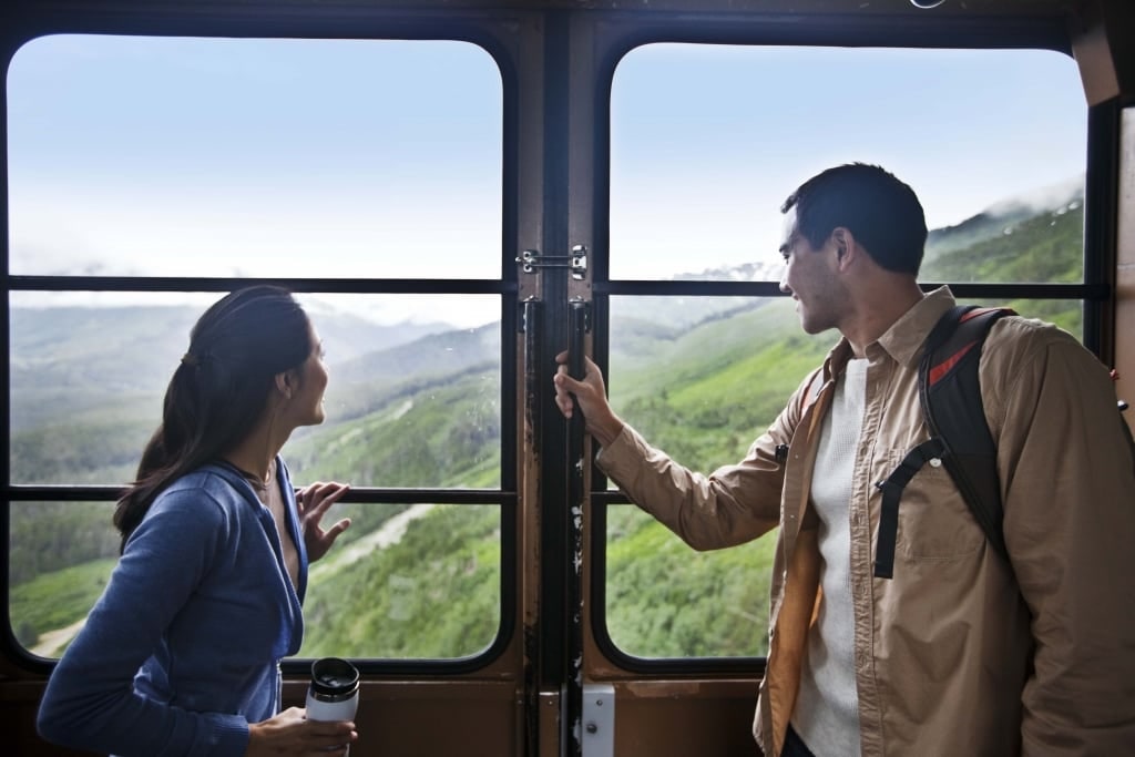 Couple inside a train in Alyeska