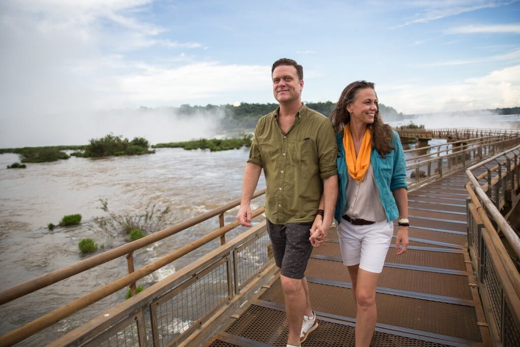Couple wandering around Iguazu Falls