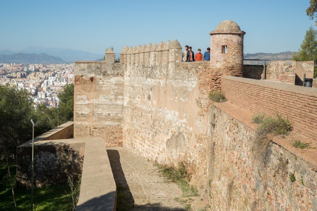 Family sightseeing from a castle in Spain