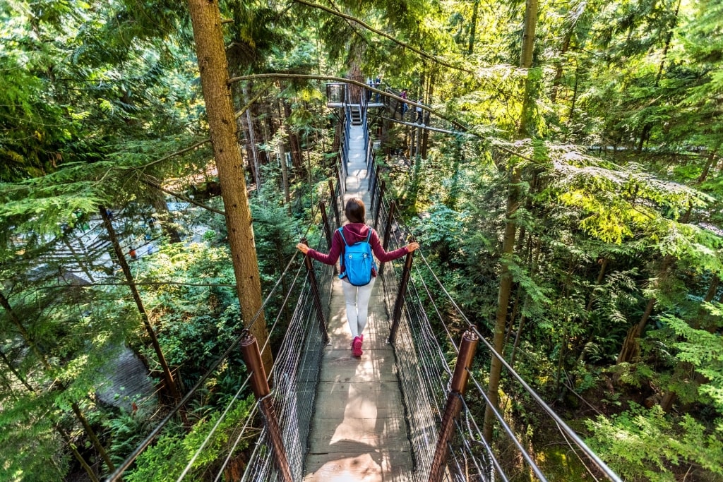 Woman walking on Capilano Suspension Bridge