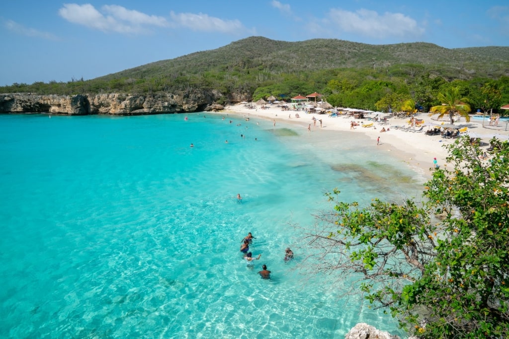 People enjoying the turquoise water of Knip Beach