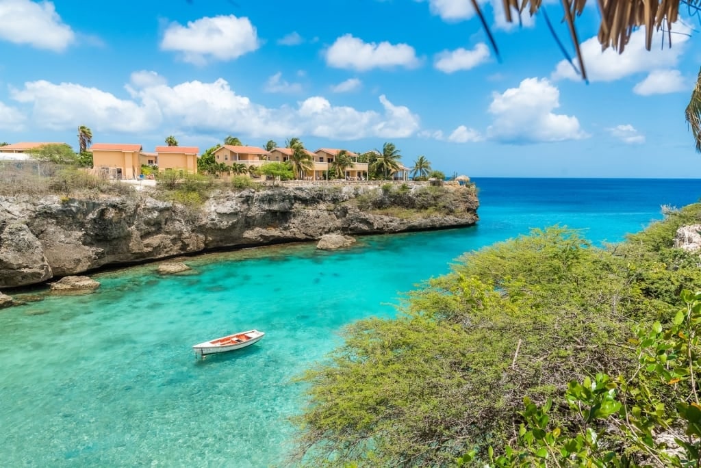 Cliff towering over the turquoise water of Playa Lagun