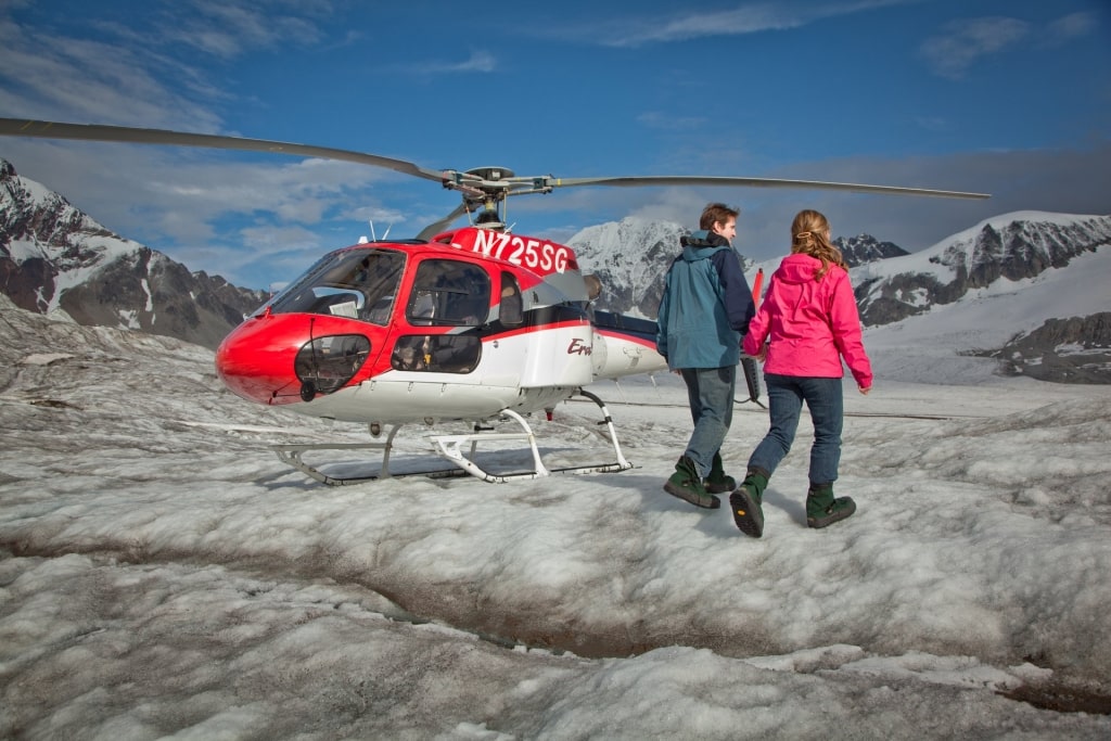 Couple standing on a glacier