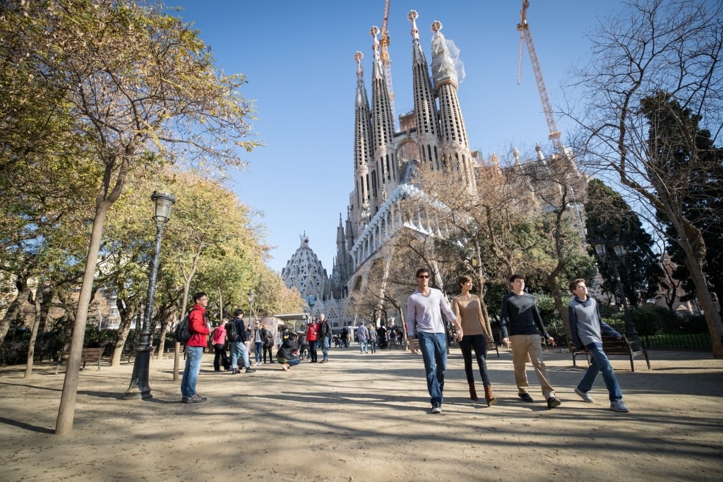 Family passing by Sagrada Familia