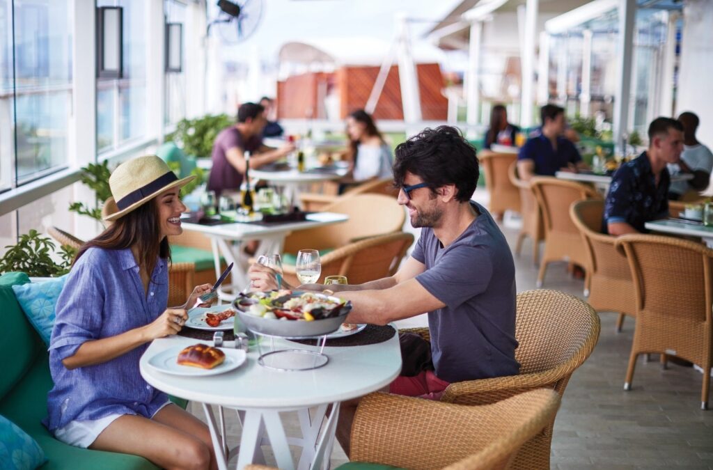 People eating at The Porch aboard Celebrity