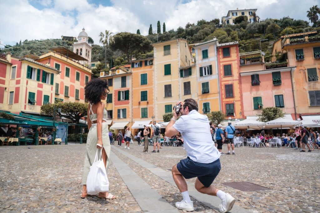 Couple enjoying the waterfront of Portofino, Italy