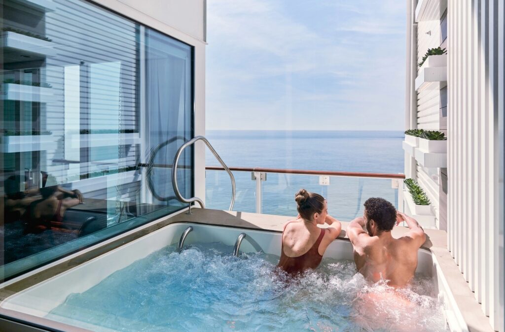 Couple relaxing from Celebrity Edge Villa