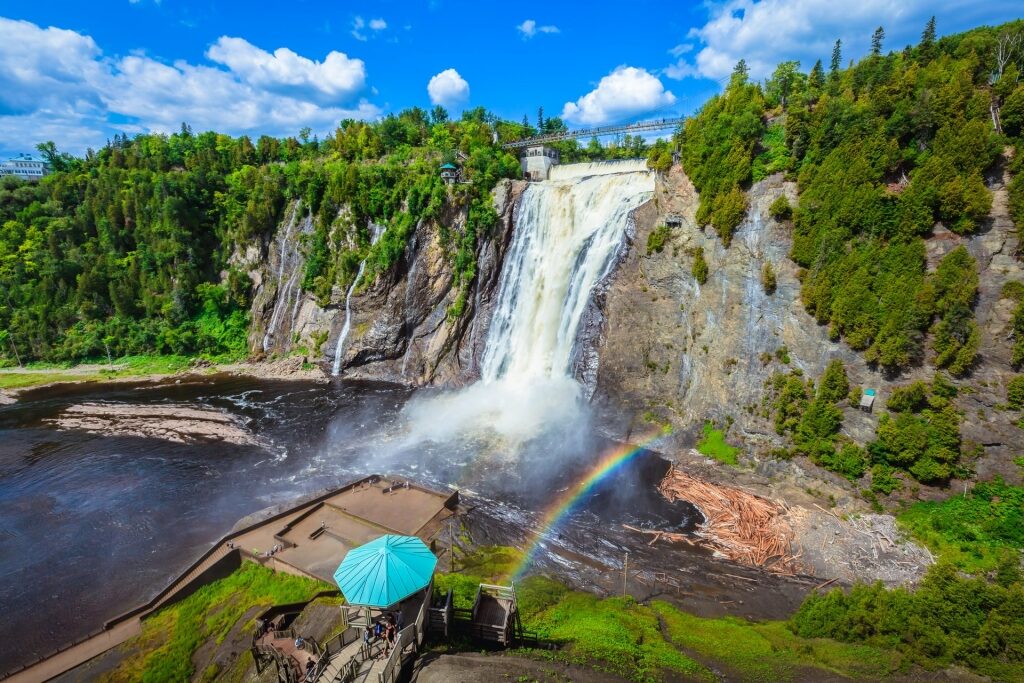 Majestic view of Montmorency Falls with rainbow