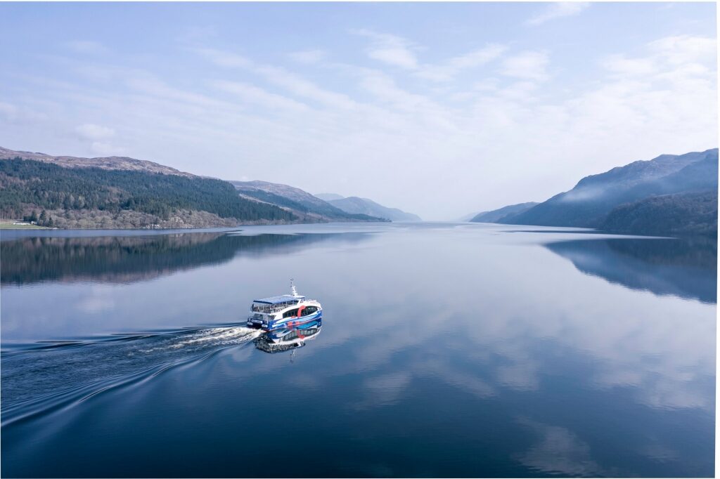 View of popular Loch Ness with boat