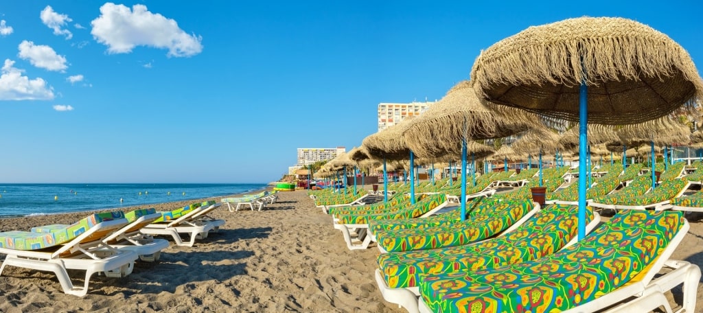 Colorful beach chairs in Playa el Bajondillo