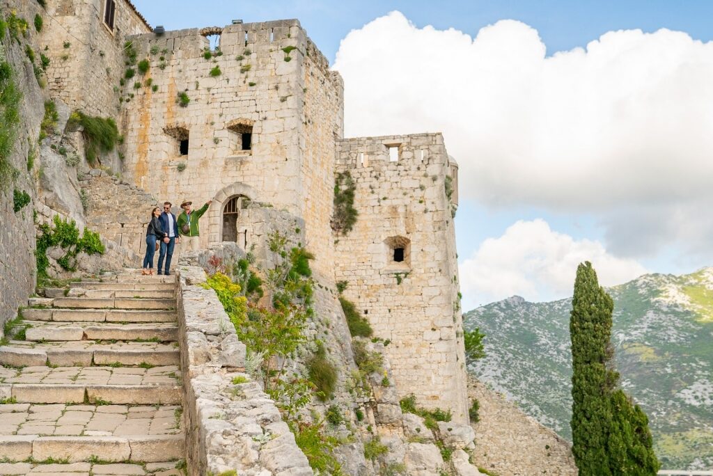 Couple sightseeing from Klis Fortress