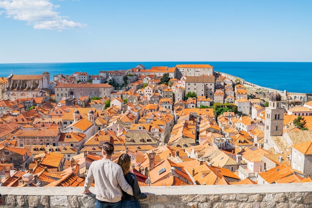 Couple looking at the beautiful houses of Dubrovnik