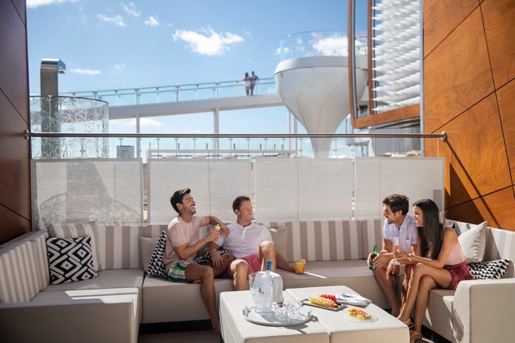 People hanging out on Celebrity Cruises deck