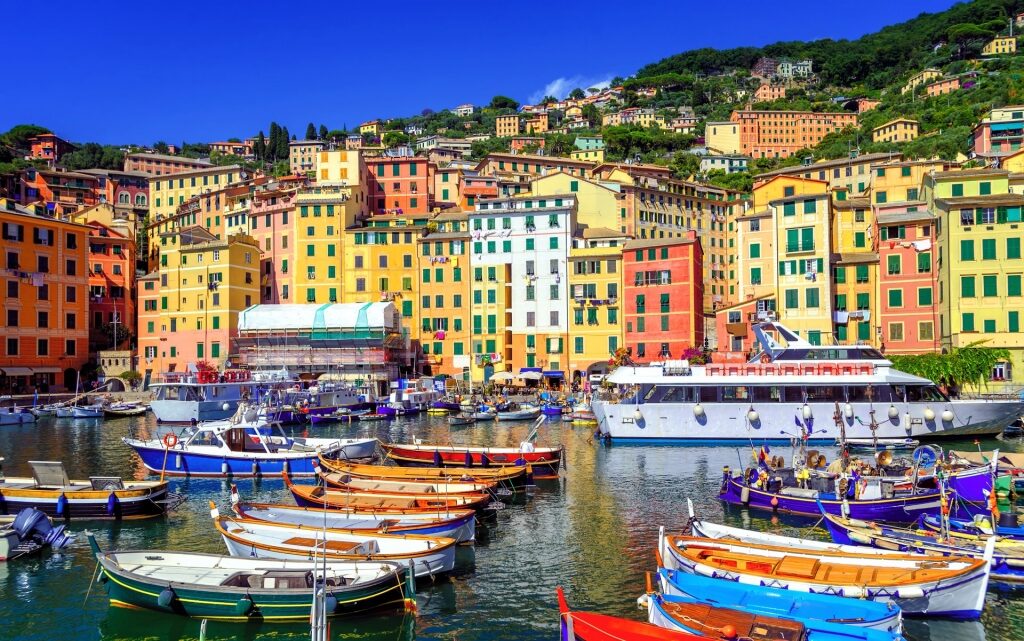 Colorful buildings by the water in Genoa