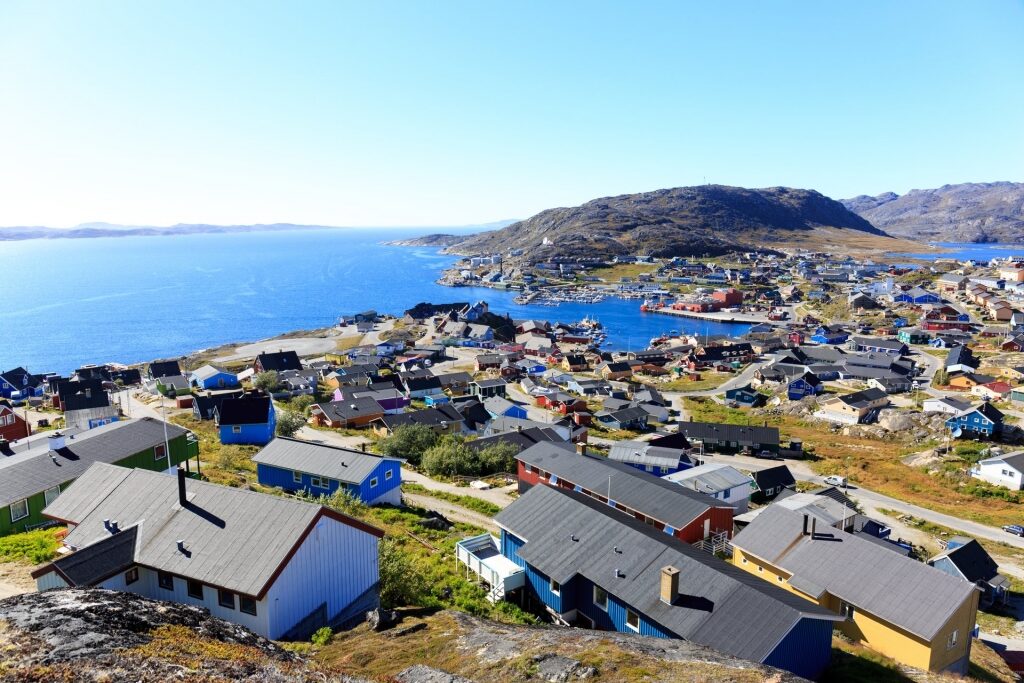 Houses in Qaqortoq with view of the water