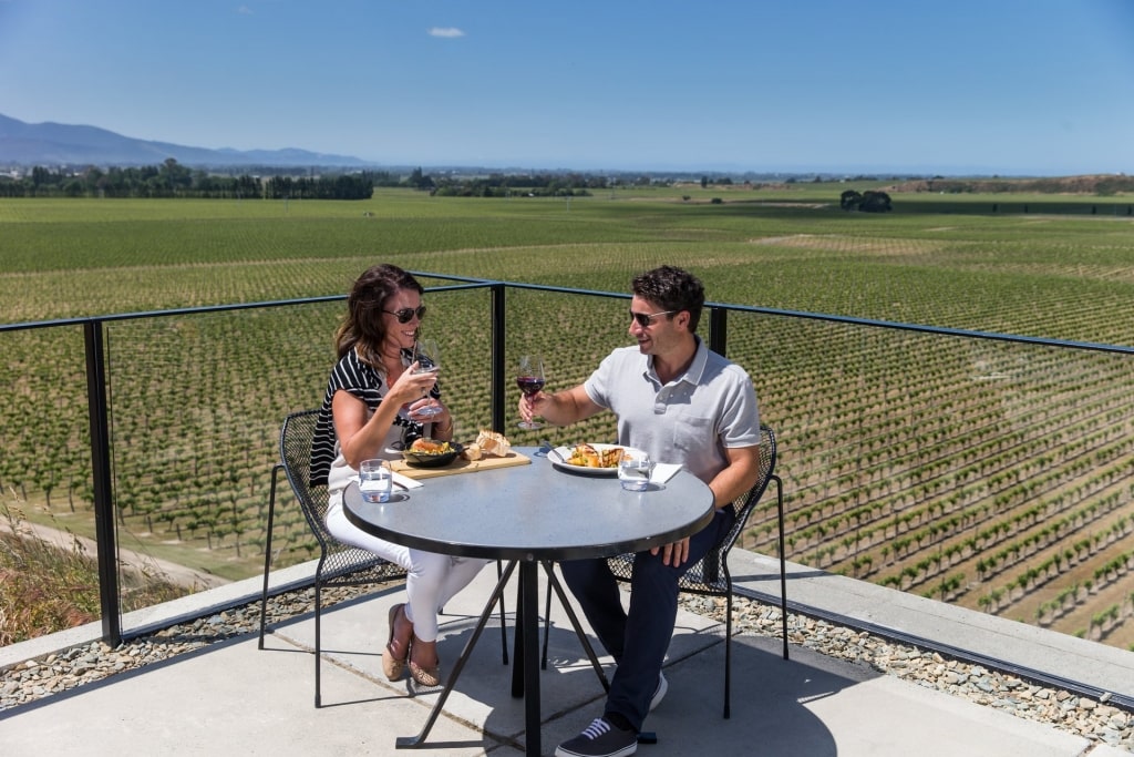 Couple drinking wine near Golden Mile