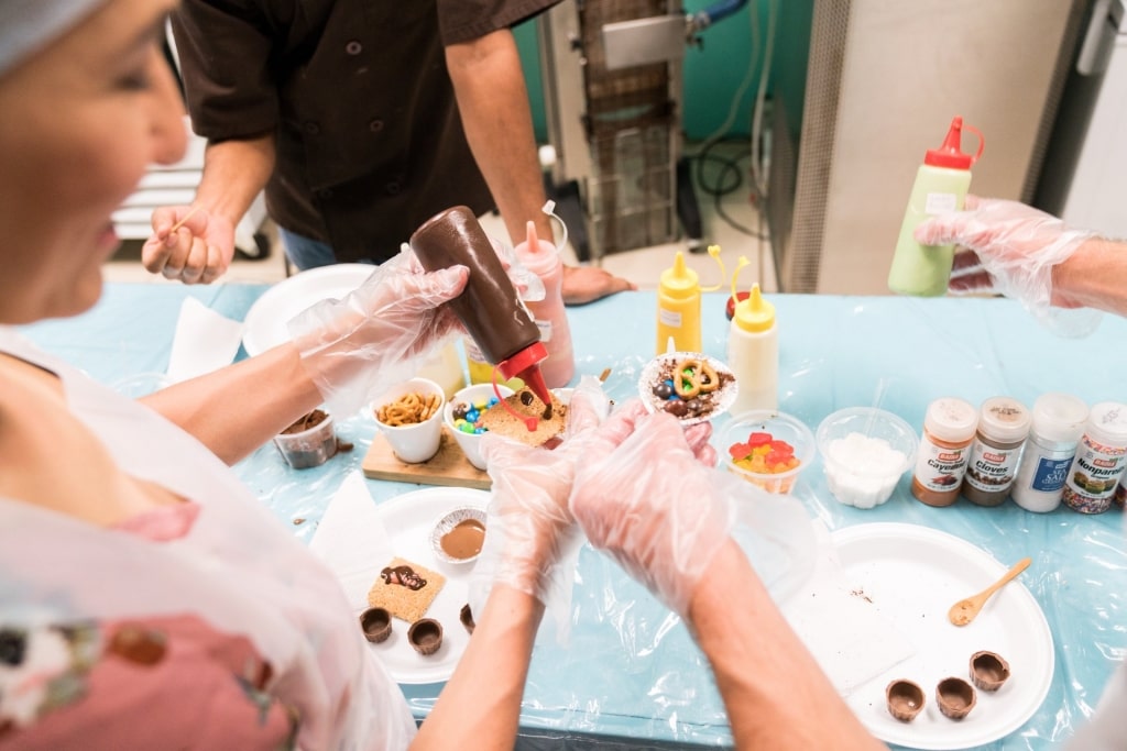 People crafting chocolates at the St. Kitts Chocolate Factory