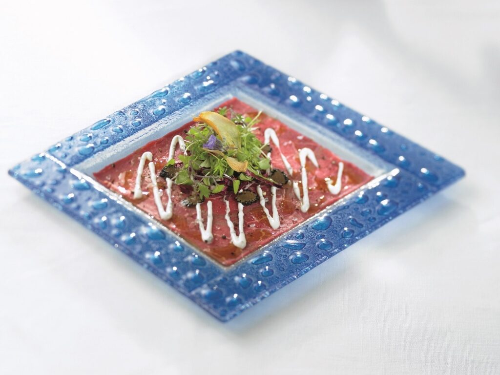 Plate of Angus Beef Carpaccio from Blu restaurant