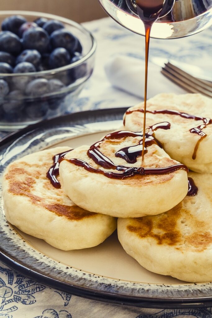 Toutons drizzled with chocolate syrup