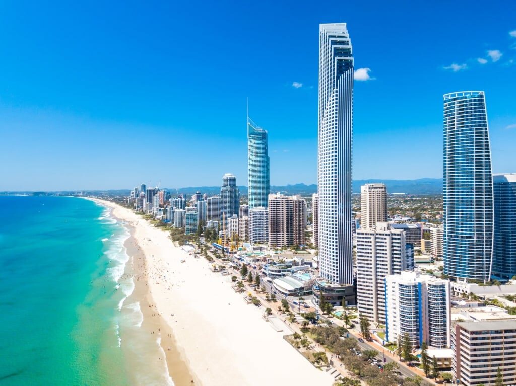 Tall buildings towering over the beach in the Gold Coast