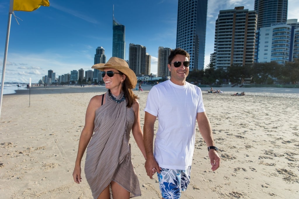 Couple walking along the Gold Coast