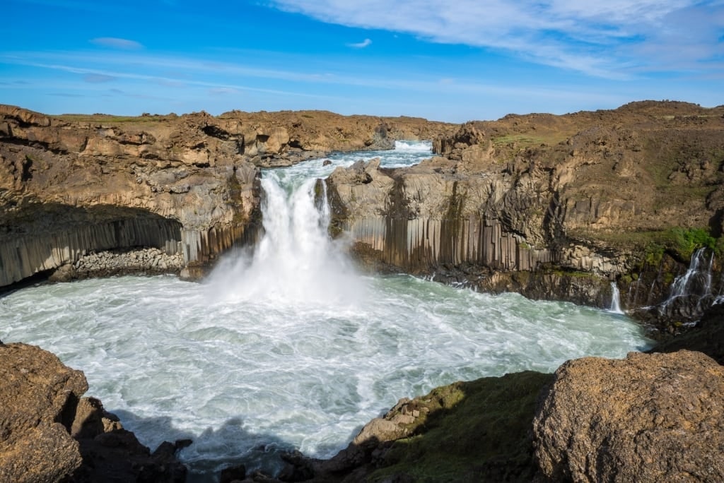 Aldeyjarfoss surrounded by black rock formations