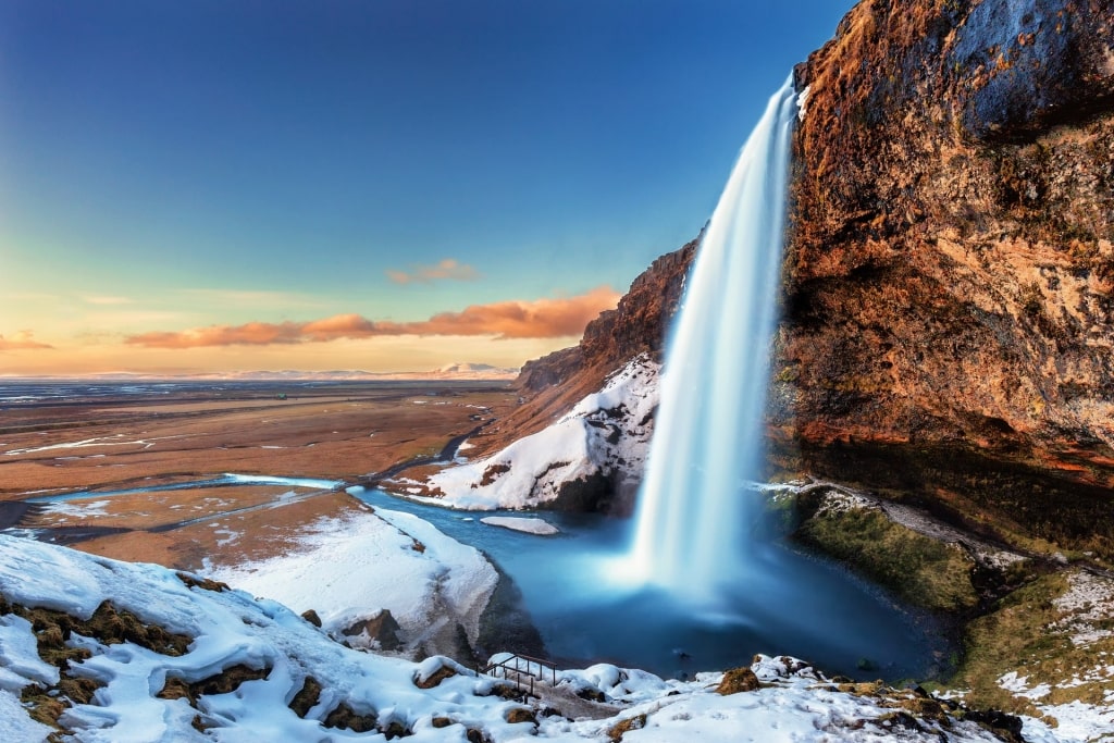 Beautiful landscape of Seljalandsfoss with snow